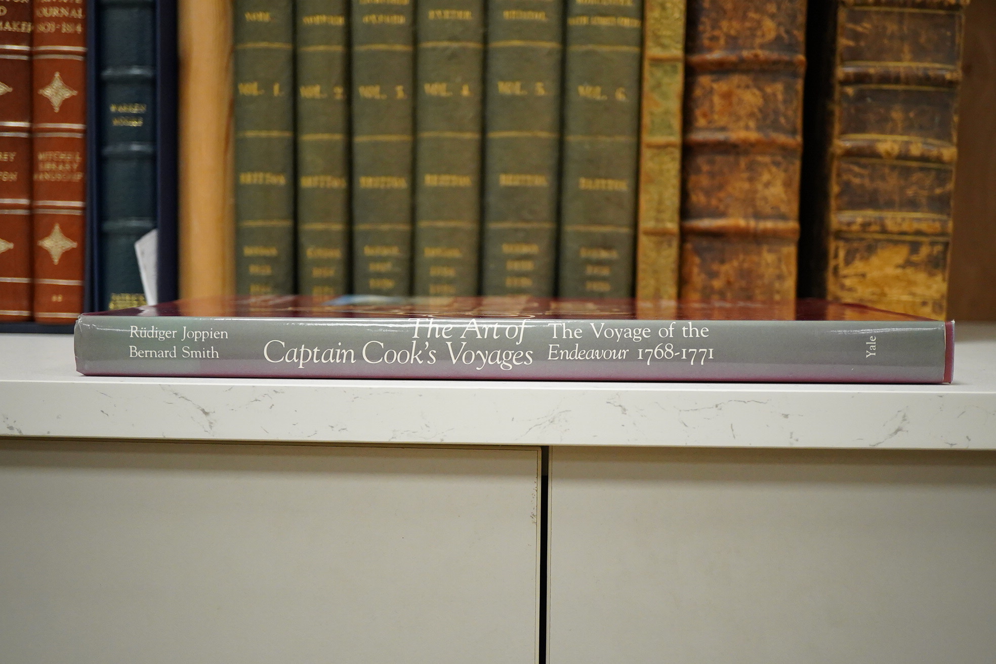 Joppien, Rudiger & Smith, Bernard - The Art of Captain Cook's Voyages ... 3 vols (in 4). illus. throughout (some full-page and coloured); publisher's cloth and d/wrappers, tall 4to. Yale University Press, 1985-88.